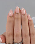 Faux-ongles nude bordure dorée